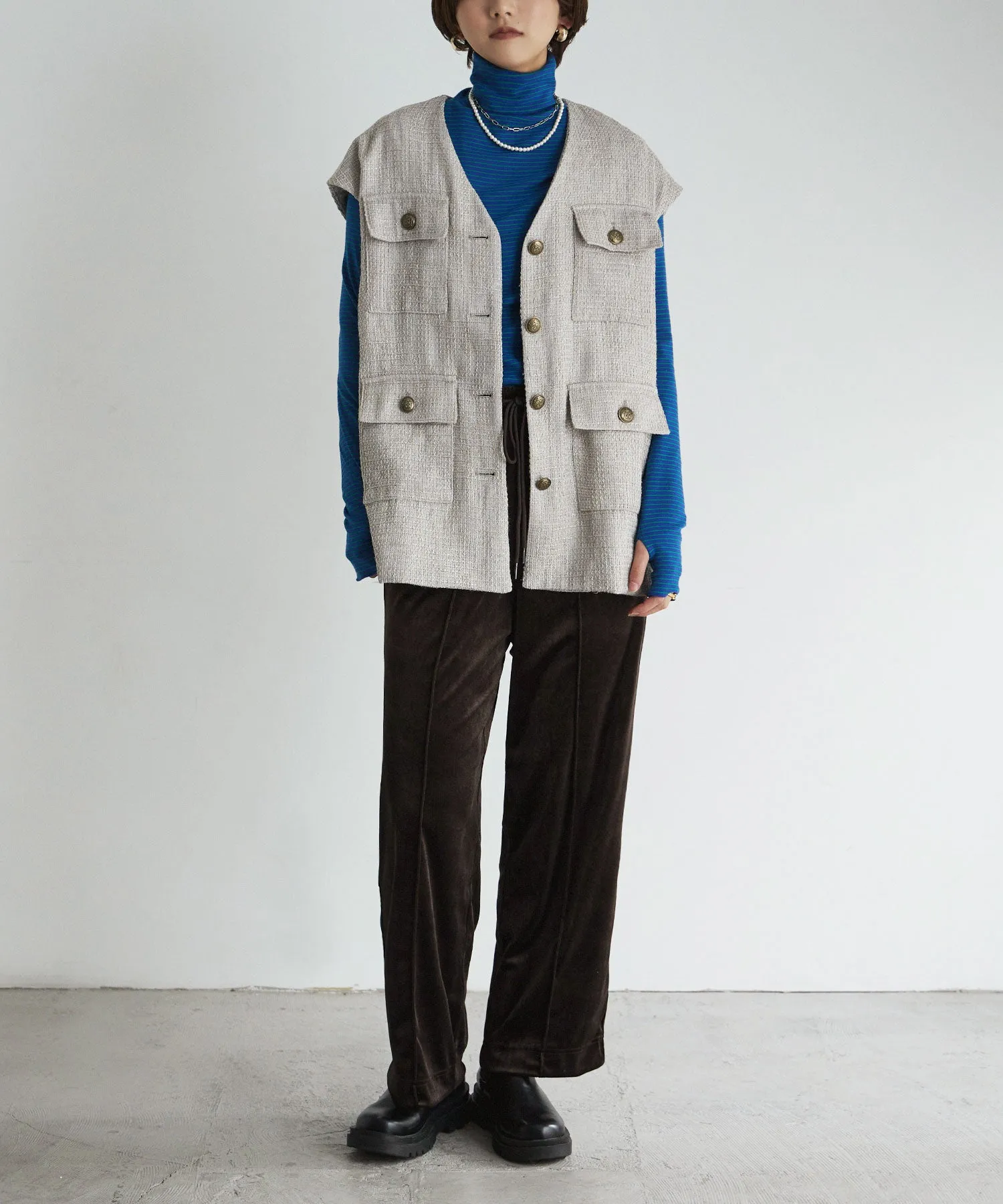 Tweed sleeveless jacket