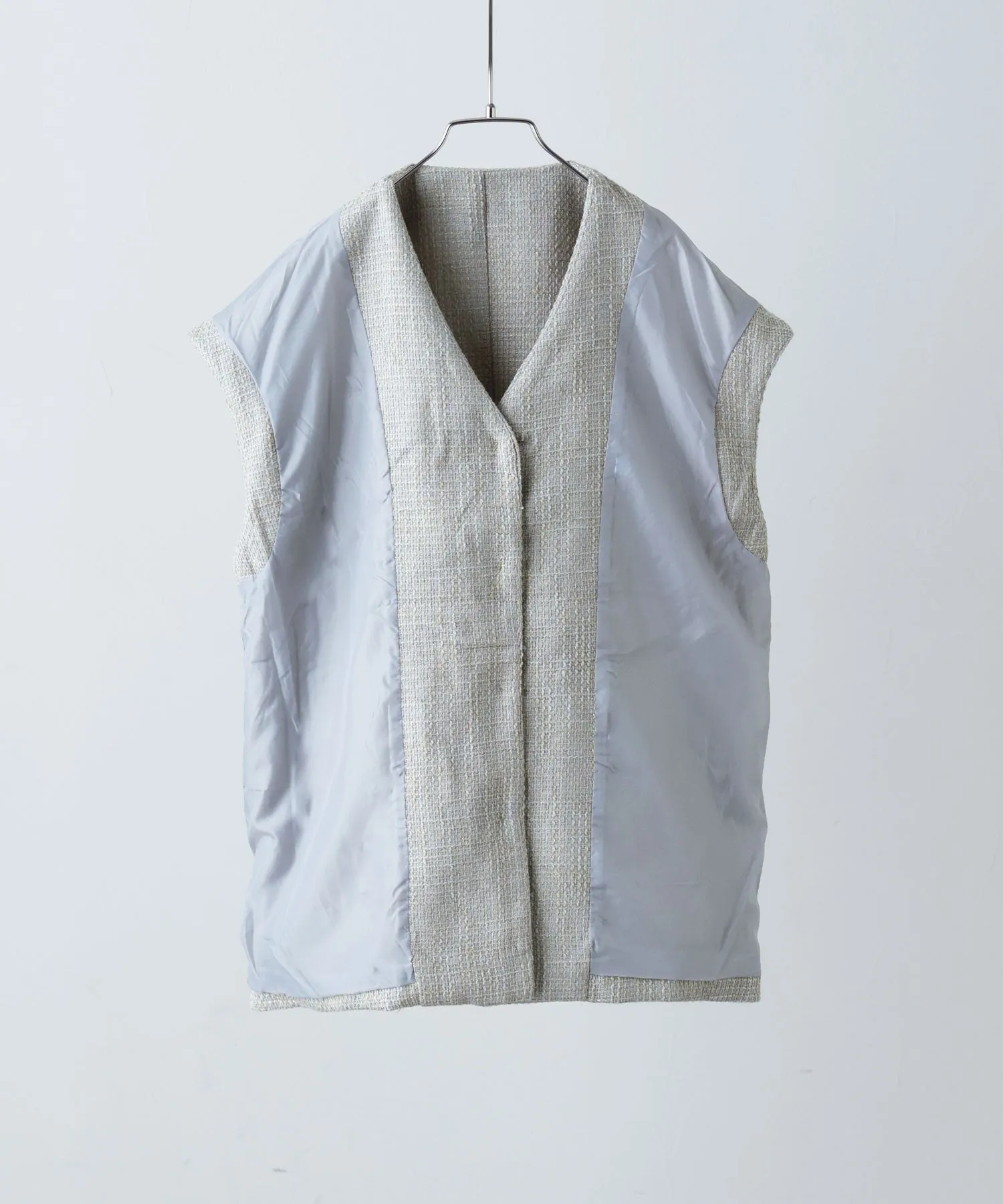 Tweed sleeveless jacket