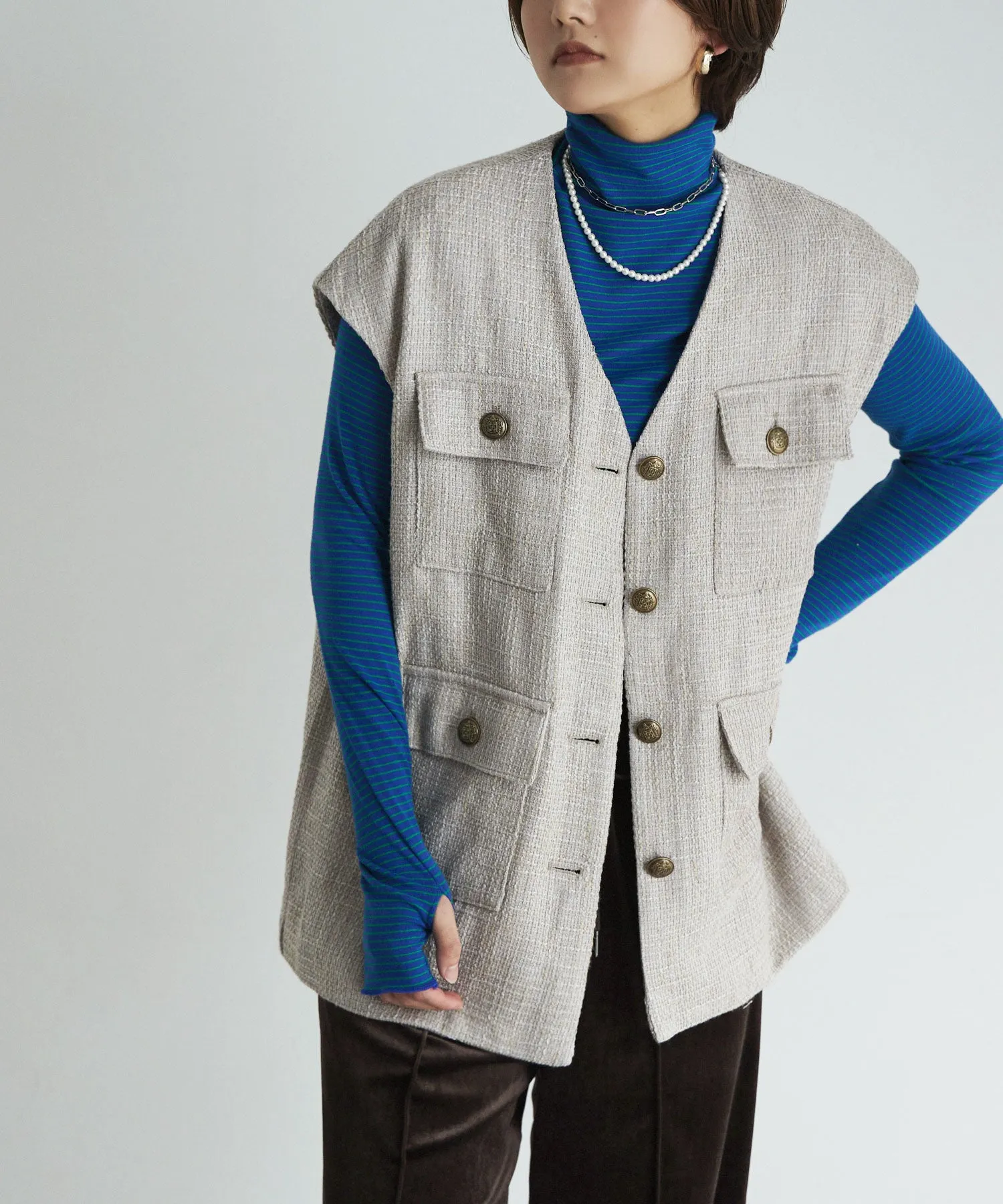 Tweed sleeveless jacket