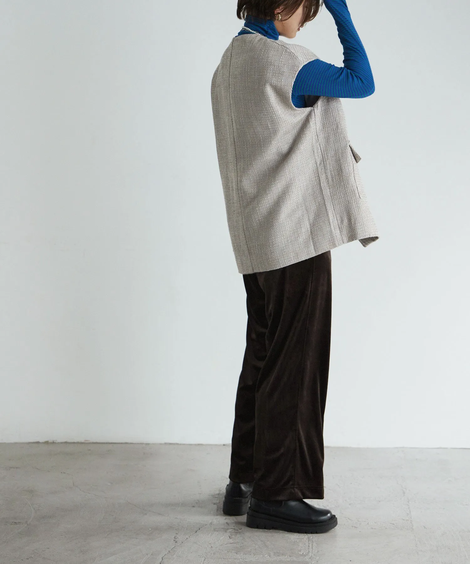 Tweed sleeveless jacket