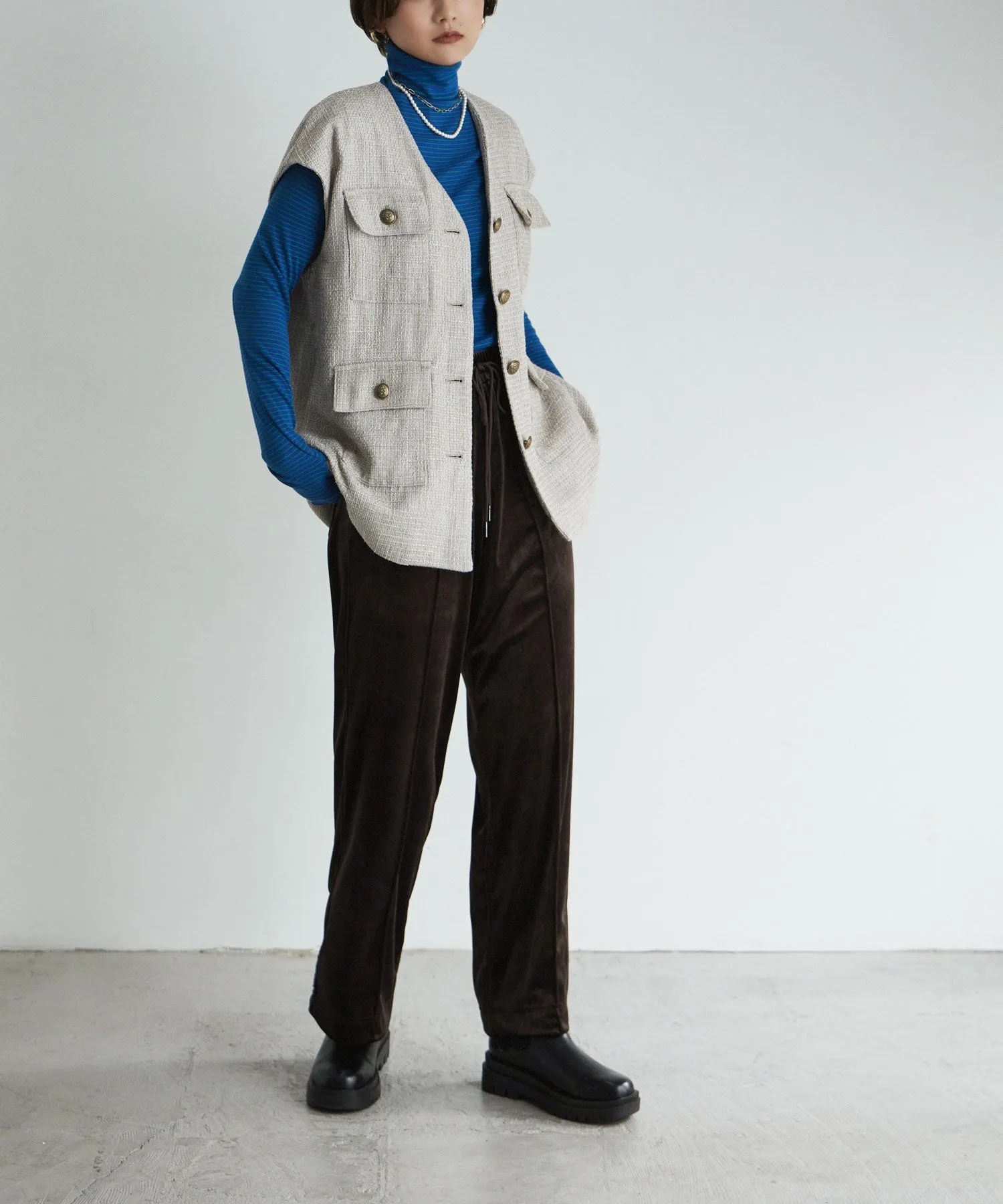 Tweed sleeveless jacket