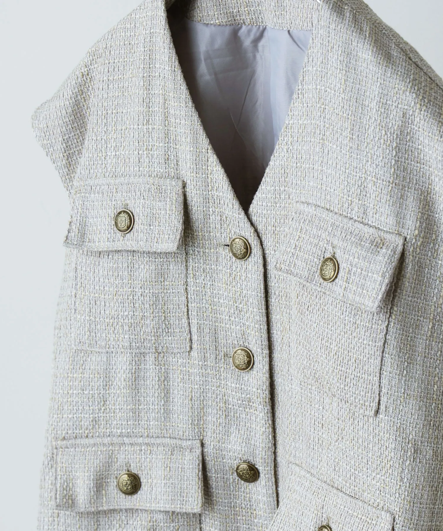 Tweed sleeveless jacket