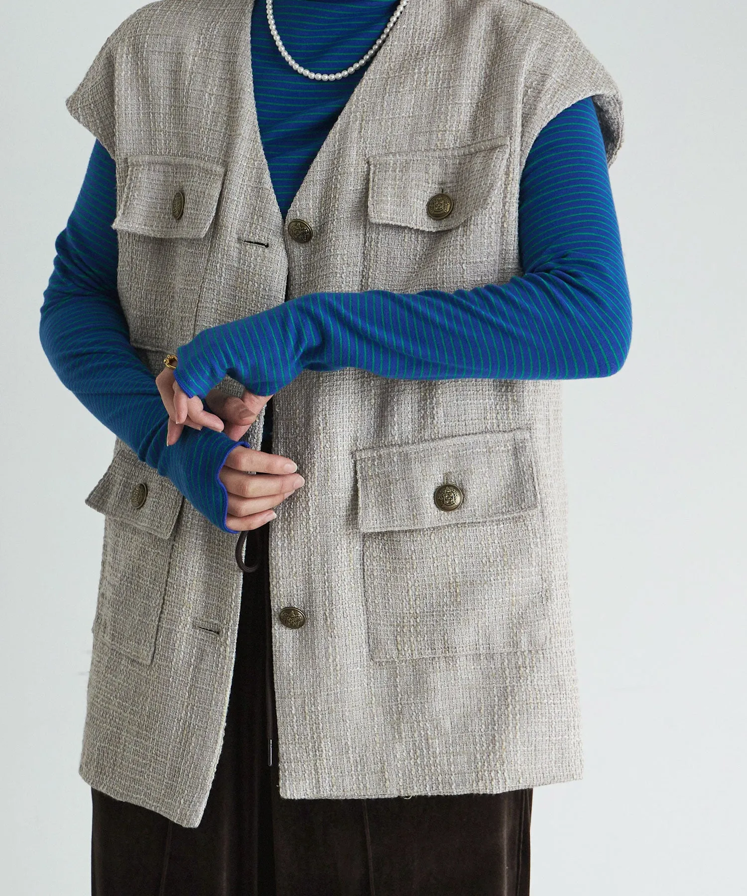 Tweed sleeveless jacket