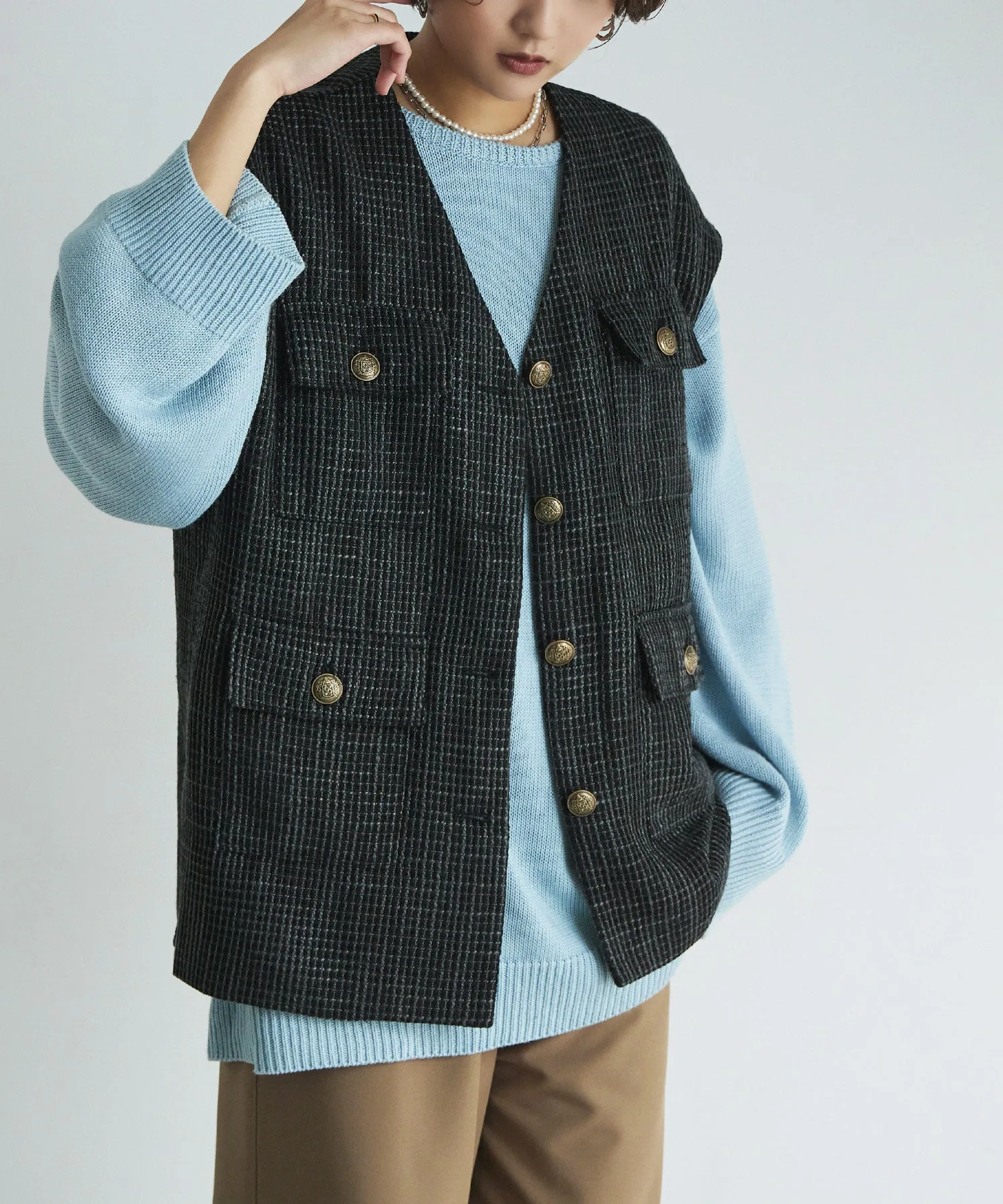 Tweed sleeveless jacket