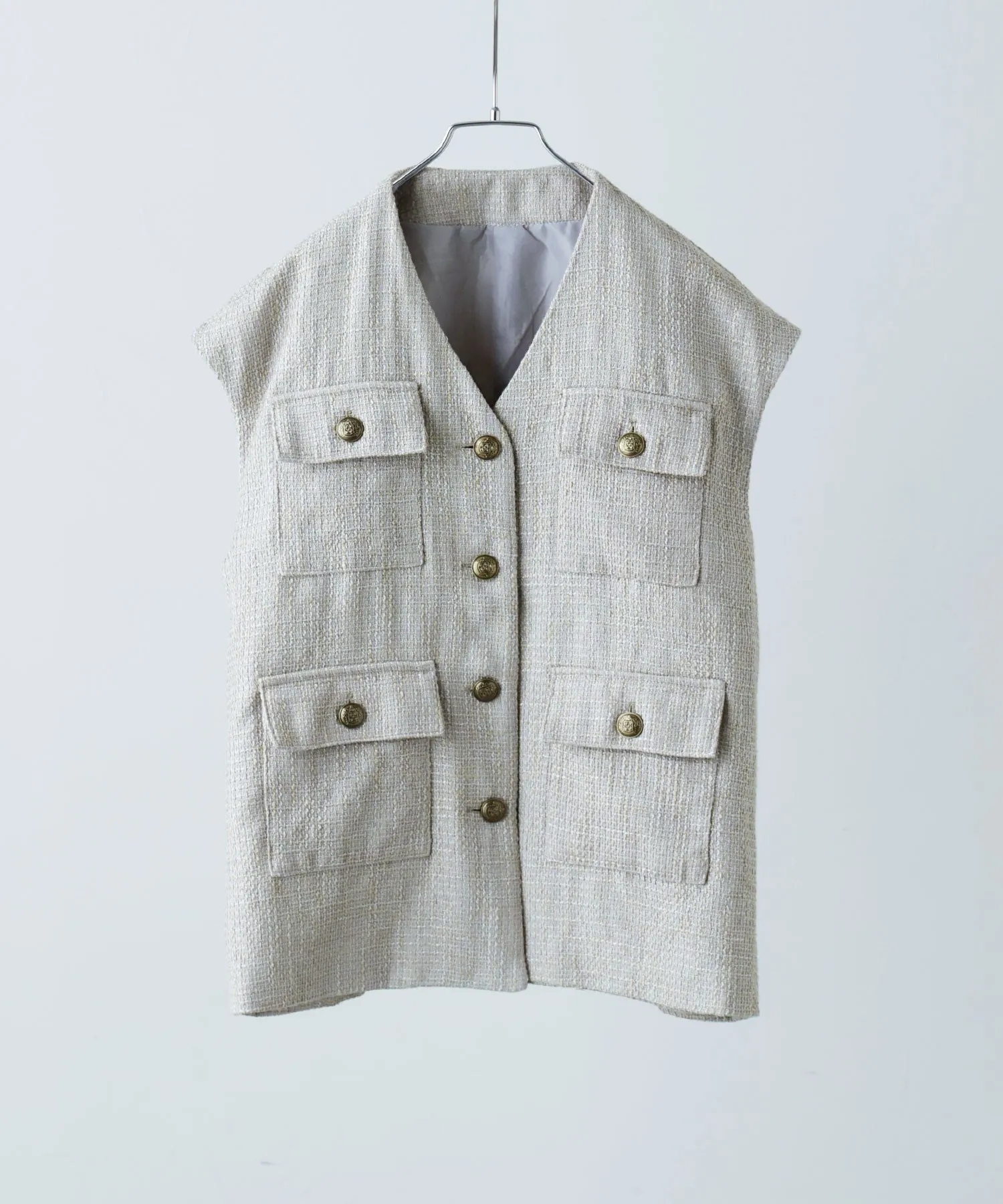 Tweed sleeveless jacket