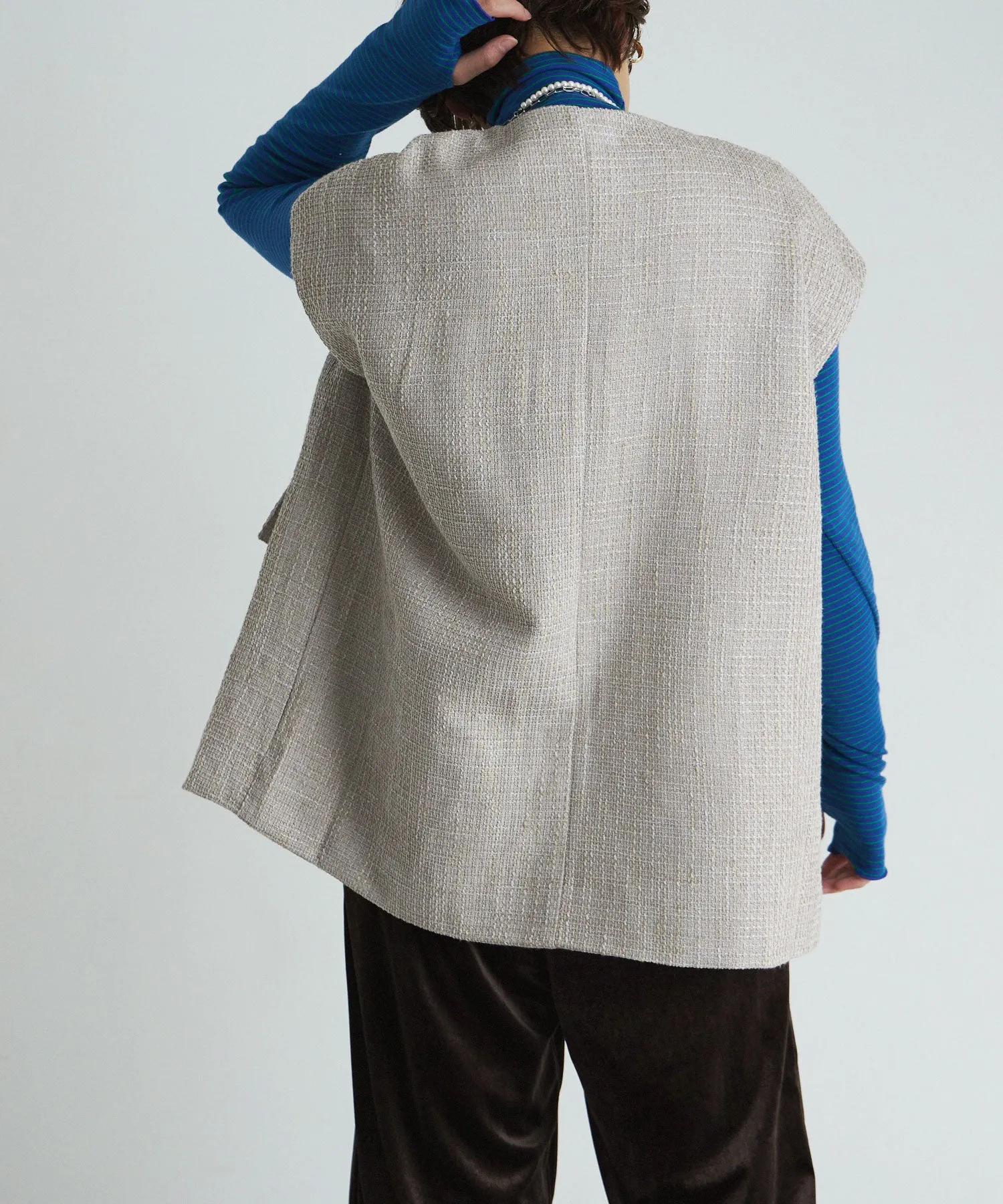 Tweed sleeveless jacket