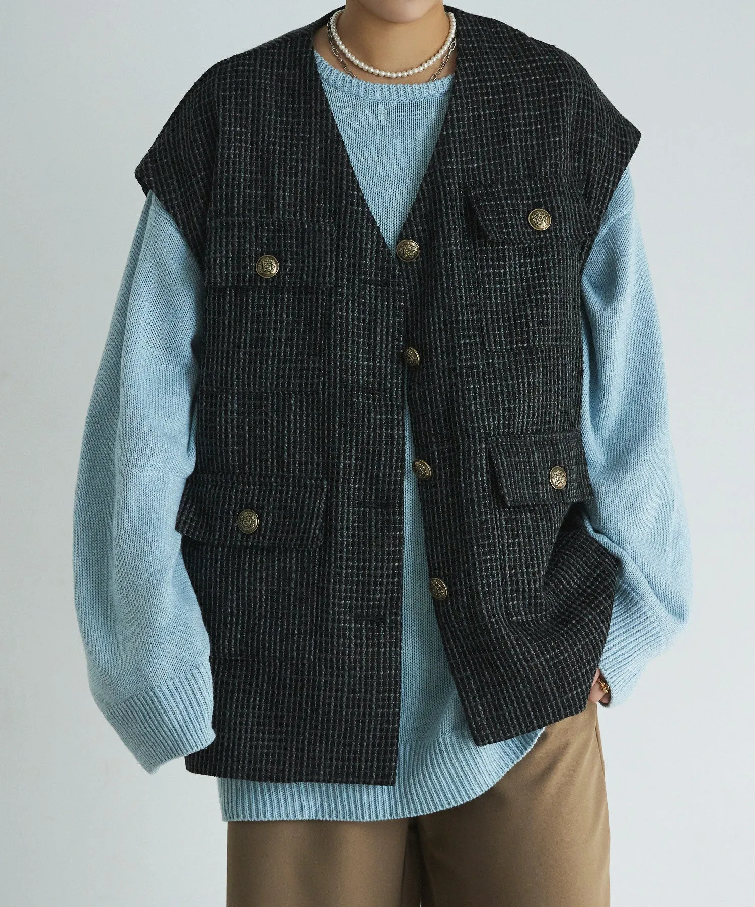 Tweed sleeveless jacket