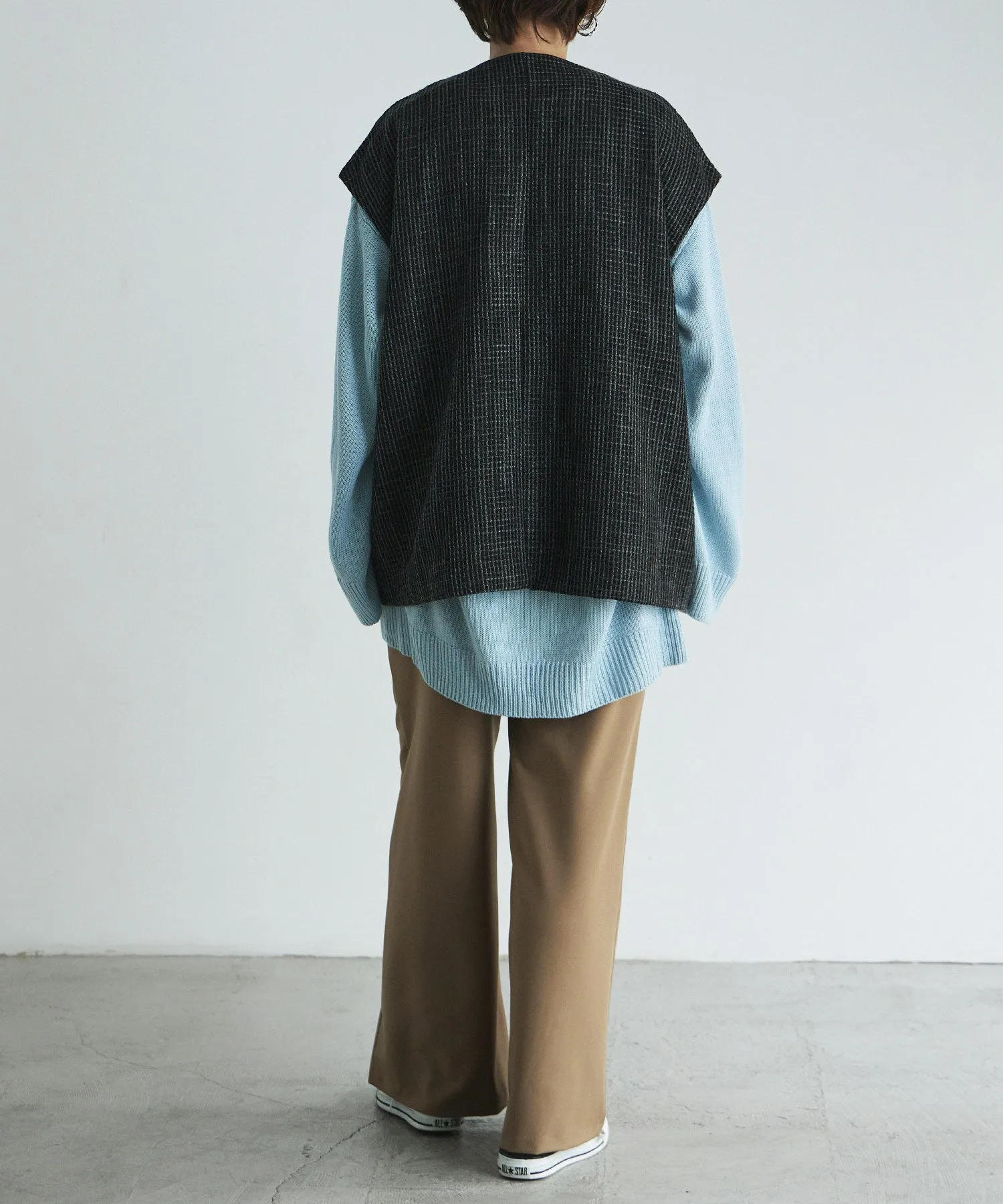 Tweed sleeveless jacket