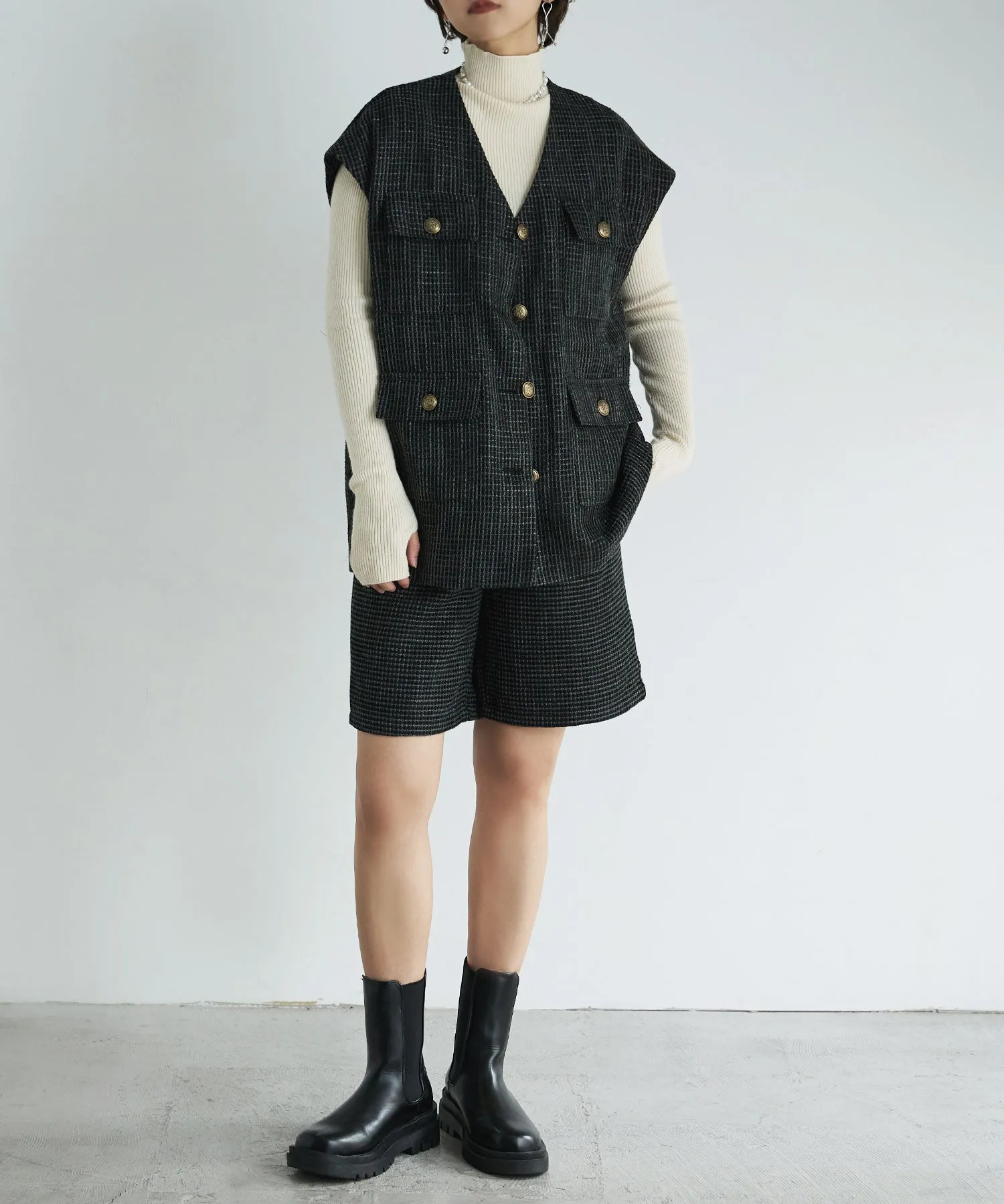 Tweed sleeveless jacket